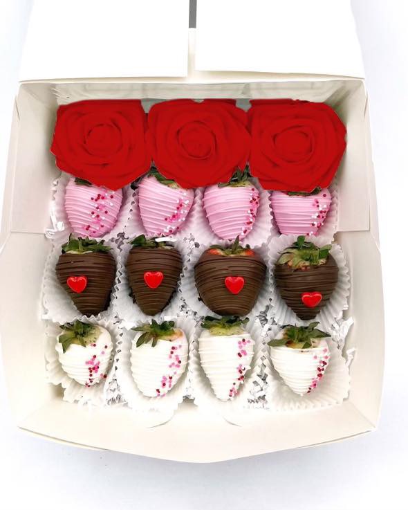 Dozen strawberries with artificial roses 